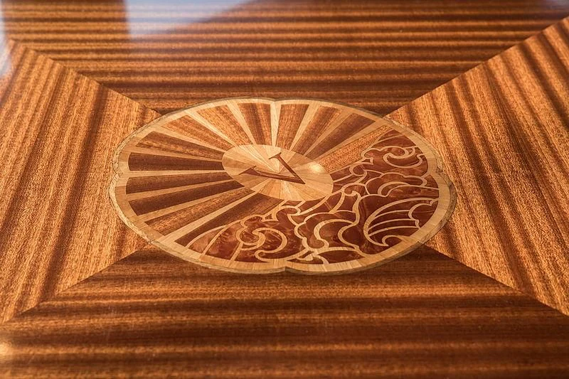 a close up of a wood table aboard VIJONARA Yacht for Sale