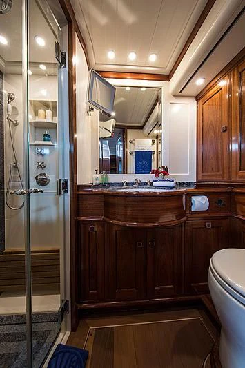 a bathroom with a glass shower aboard VIJONARA Yacht for Sale