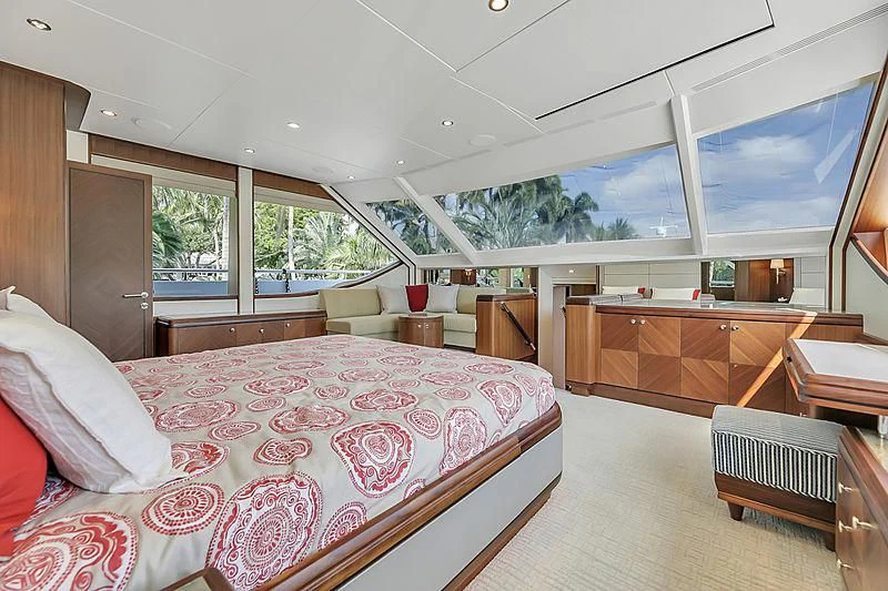 a bedroom with a large bed aboard PALINE II Yacht for Sale