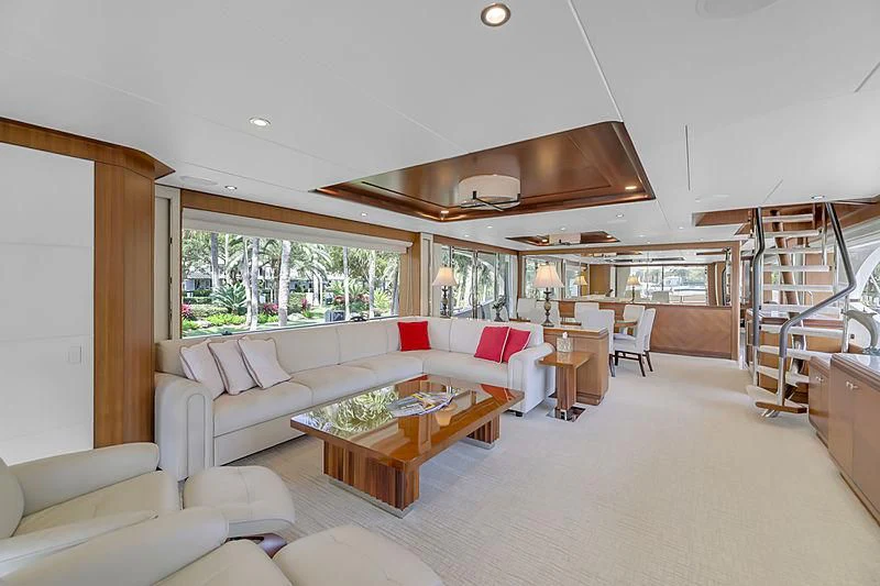 a living room with a staircase aboard PALINE II Yacht for Sale
