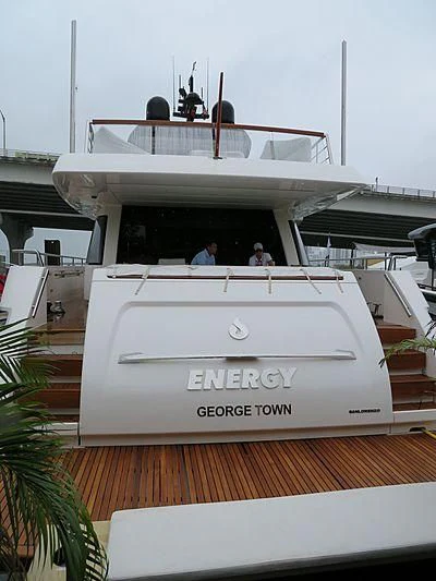 a white boat with a group of people on it aboard EASIEST CHILD Yacht for Sale