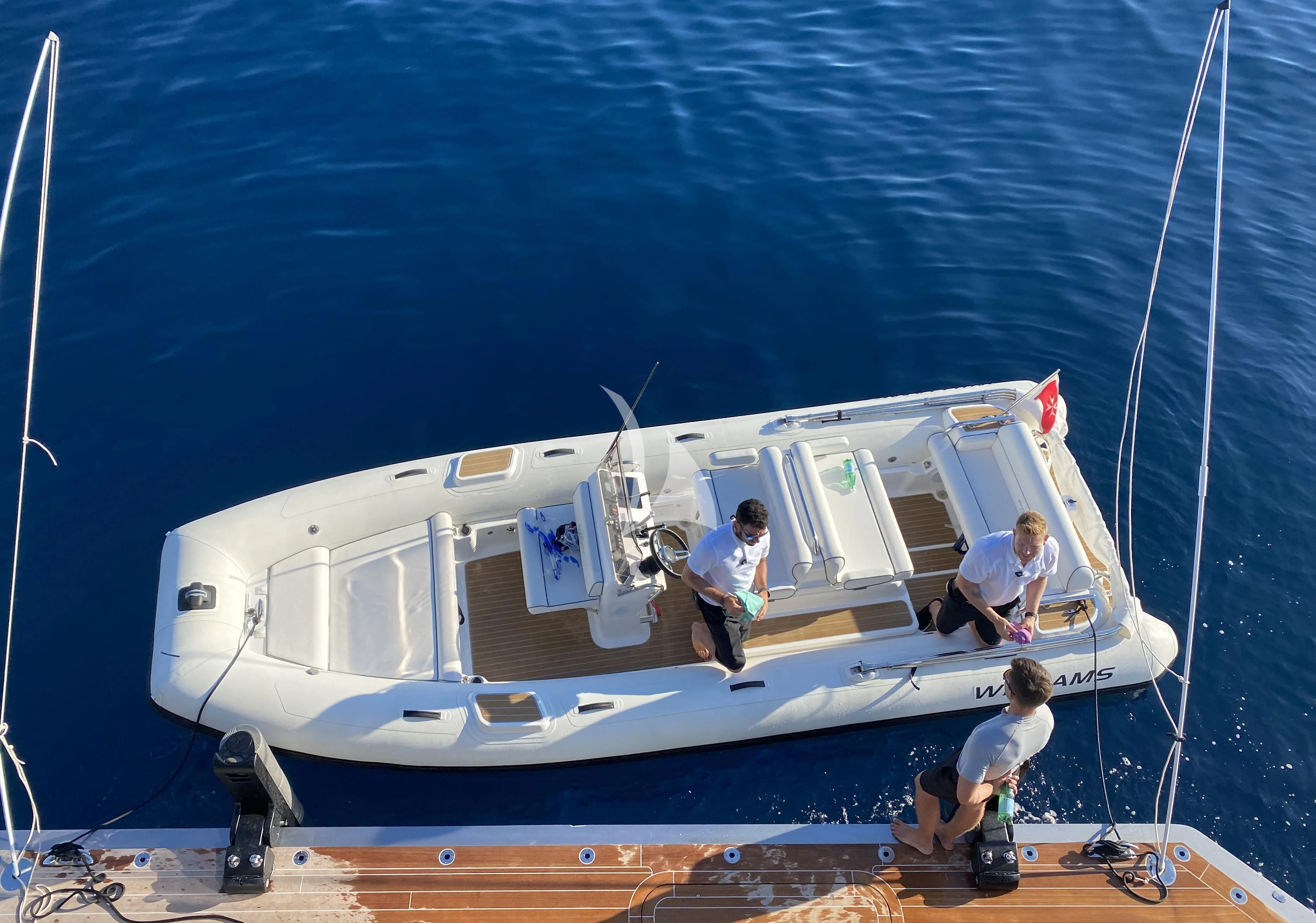 a group of people on a boat aboard PANDION PEARL Yacht for Charter