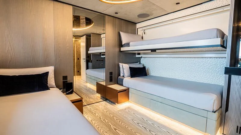 a room with two beds aboard PANDION PEARL Yacht for Charter