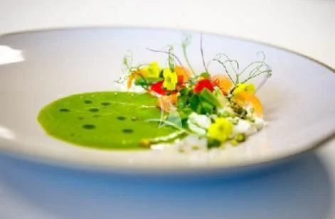 a plate of food aboard PANDION PEARL Yacht for Charter
