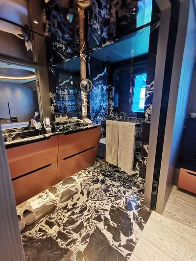 a bathroom with a large marble counter aboard PANDION PEARL Yacht for Charter