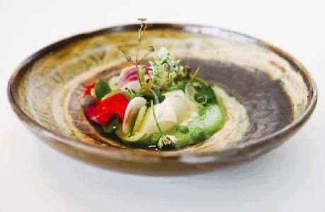 a bowl of food aboard PANDION PEARL Yacht for Charter