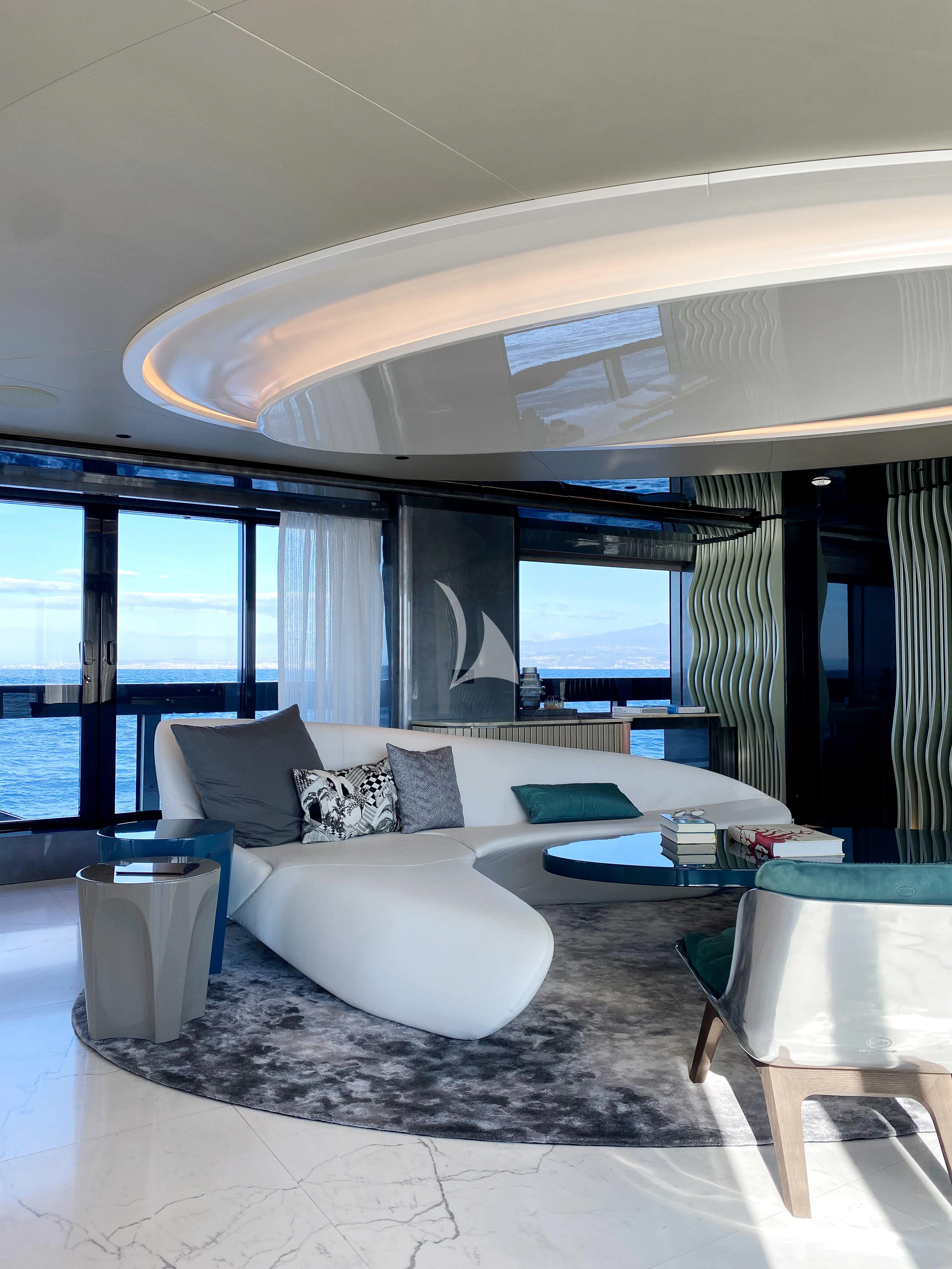 a large white couch in a room aboard PANDION PEARL Yacht for Charter