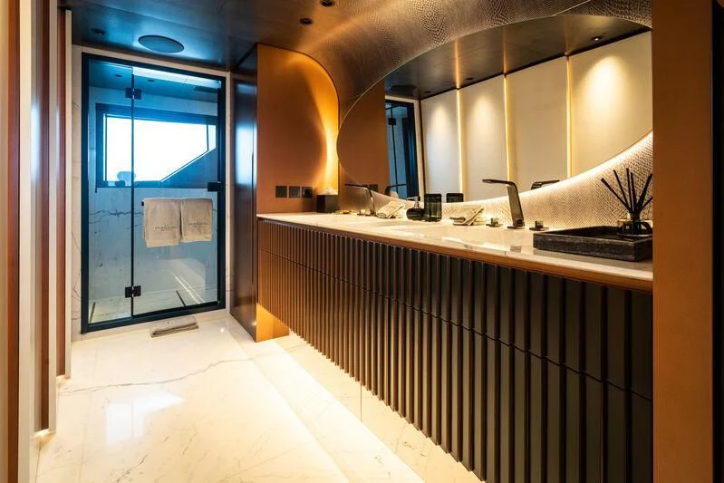 a kitchen with a large window aboard PANDION PEARL Yacht for Charter