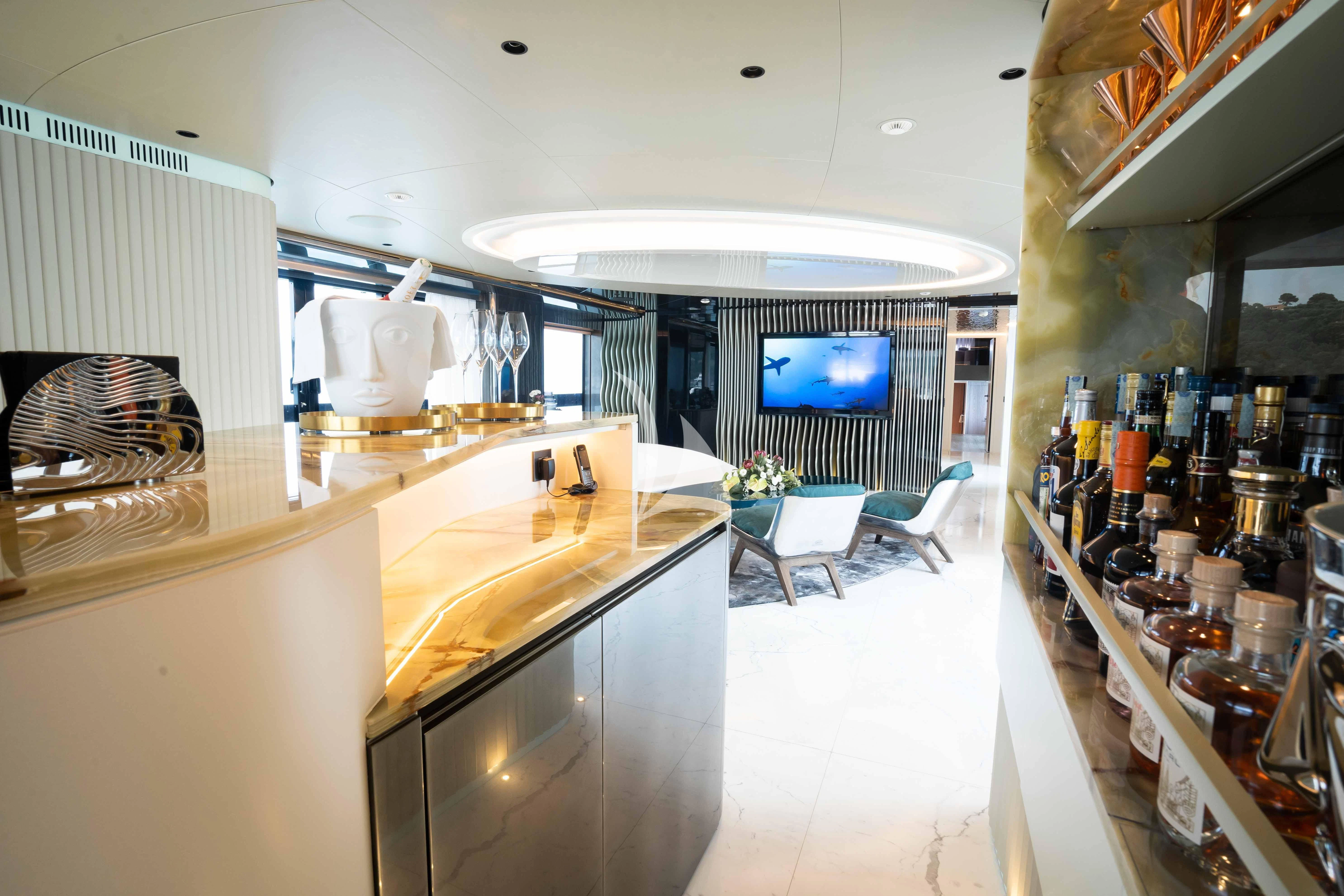 a large kitchen with a large window aboard PANDION PEARL Yacht for Charter