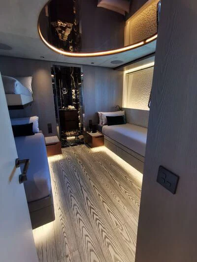 a room with a couch and a table aboard PANDION PEARL Yacht for Charter