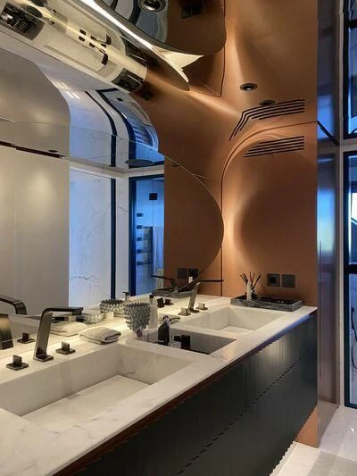 a bathroom with sinks and mirrors aboard PANDION PEARL Yacht for Charter