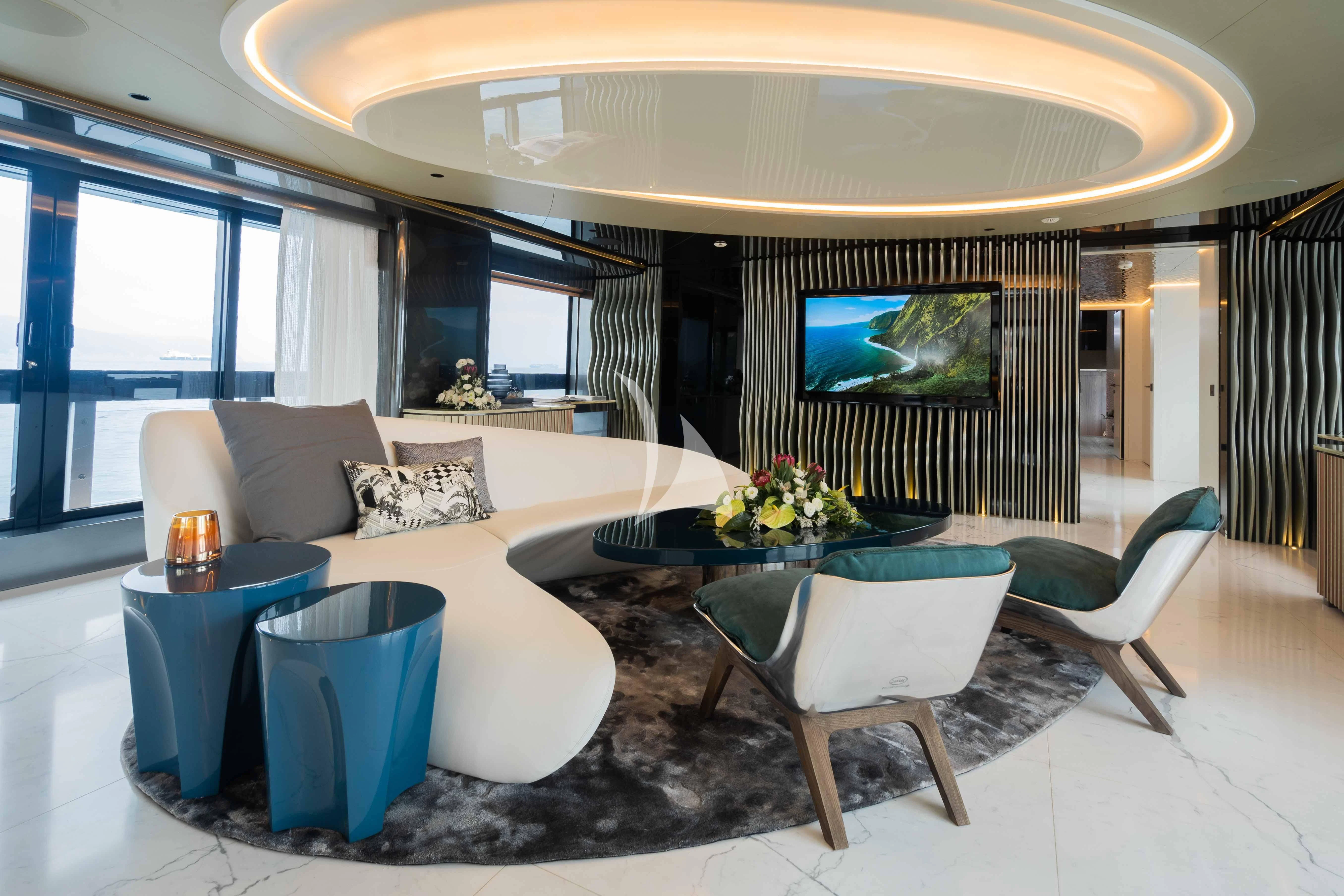 a living room with a large window aboard PANDION PEARL Yacht for Charter