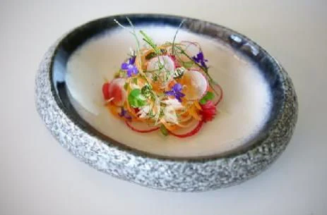 a plate of food aboard PANDION PEARL Yacht for Charter