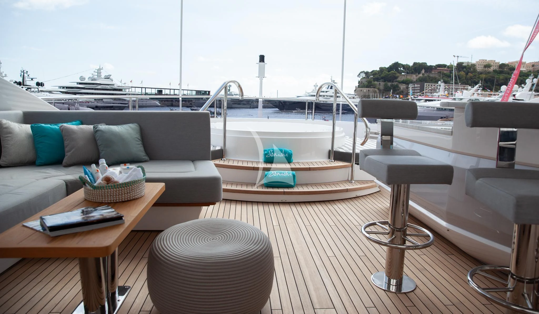 a living room with a deck aboard SONISHI Yacht for Sale