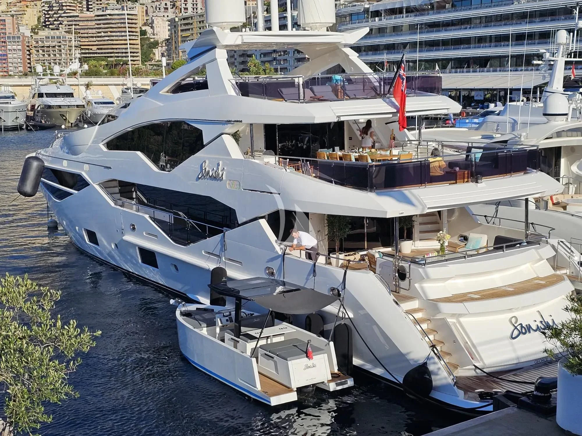 a boat docked in a harbor aboard SONISHI Yacht for Sale