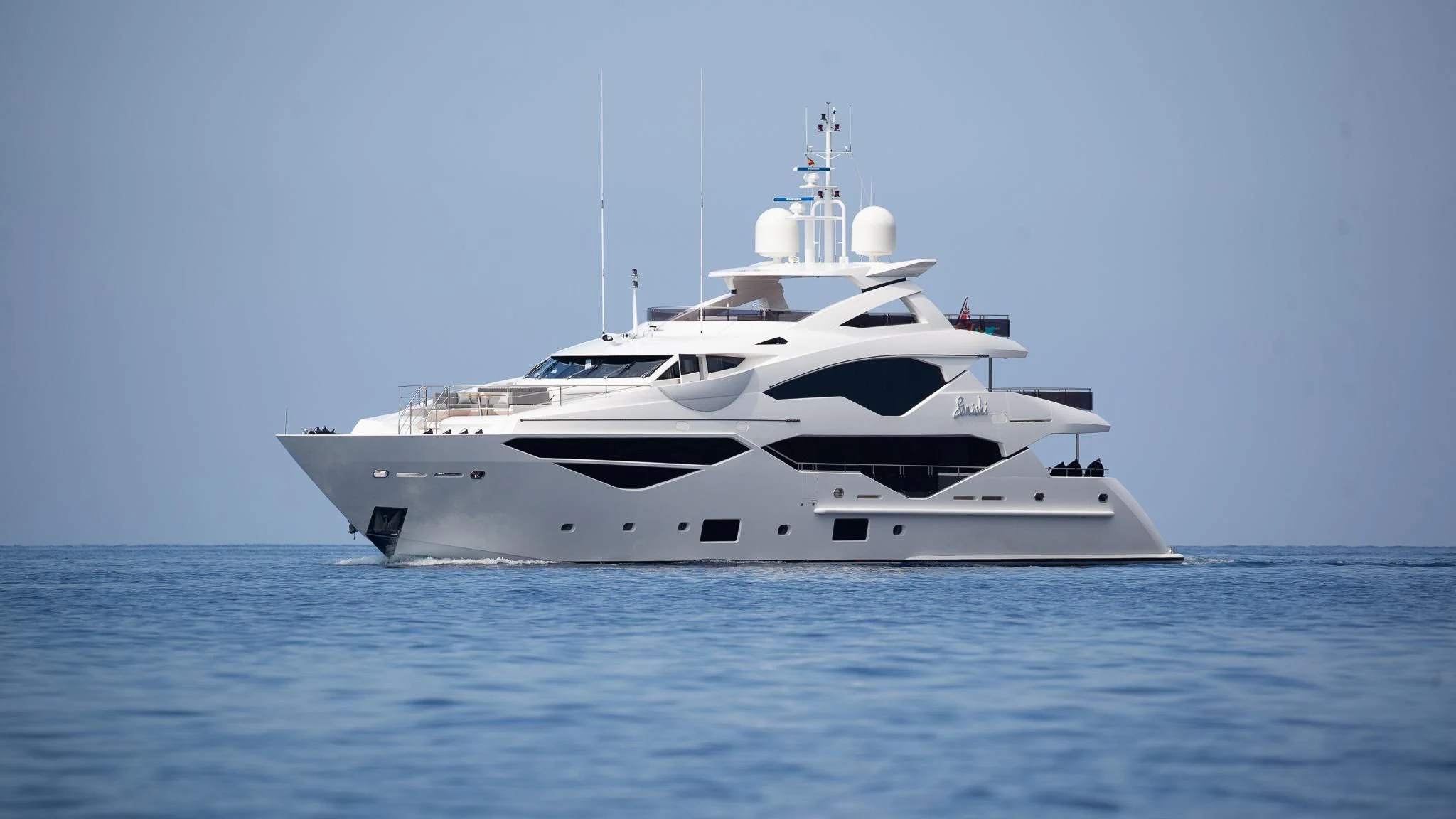 a white yacht in the water aboard SONISHI Yacht for Sale