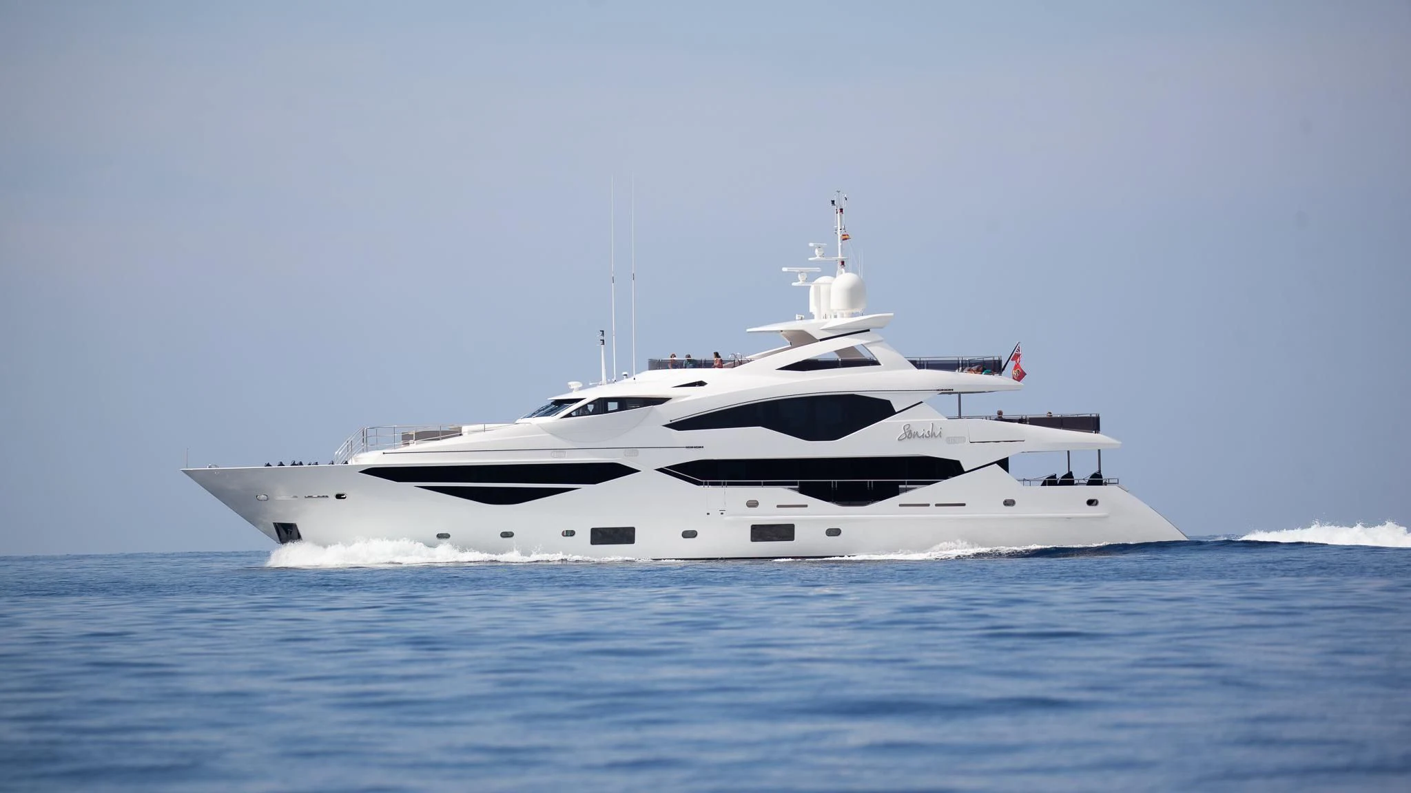 a white yacht in the water aboard SONISHI Yacht for Sale