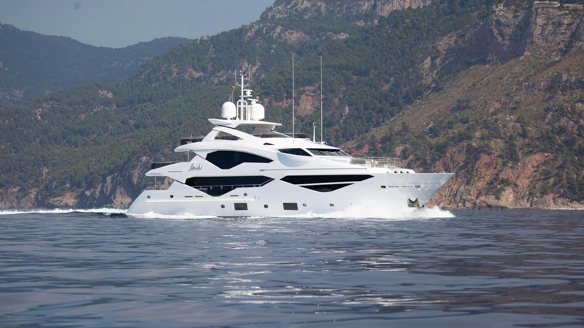 a white yacht on water aboard SONISHI Yacht for Sale