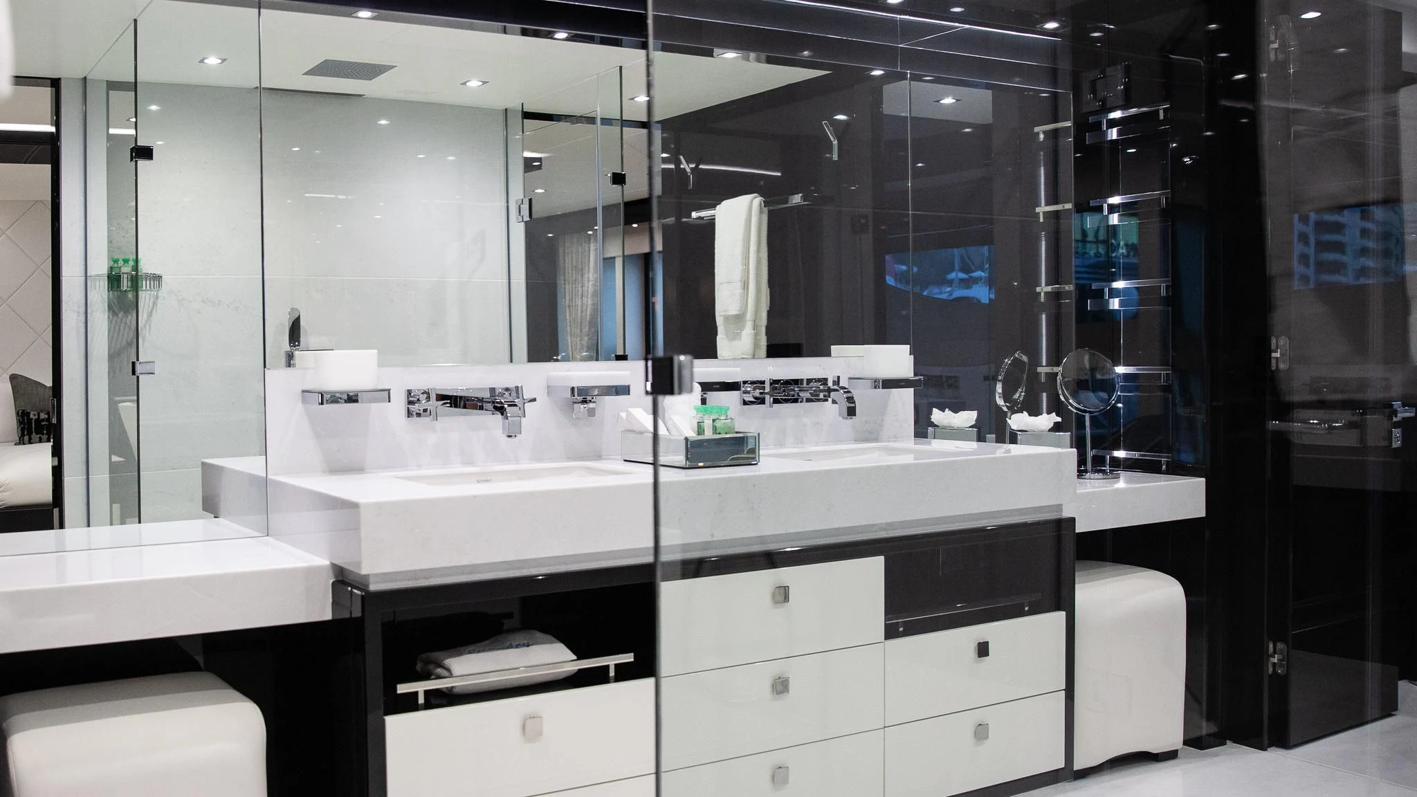 a bathroom with a large mirror aboard SONISHI Yacht for Sale