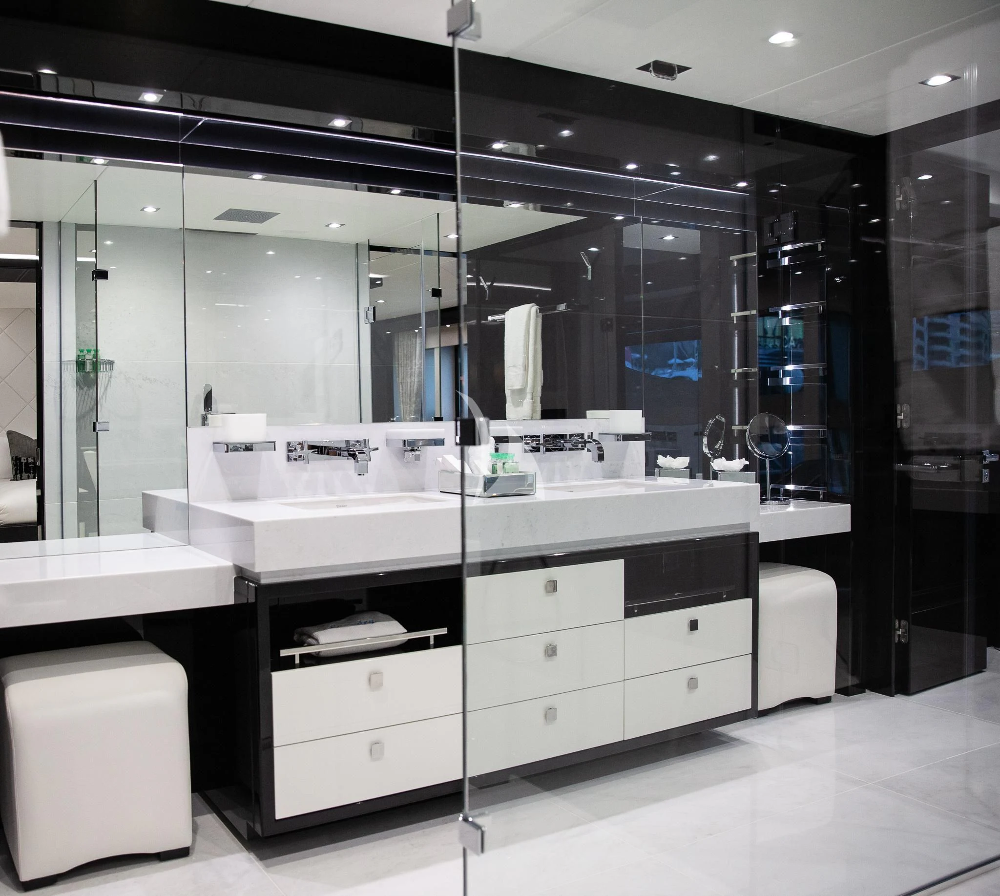 a large bathroom with a glass wall aboard SONISHI Yacht for Sale