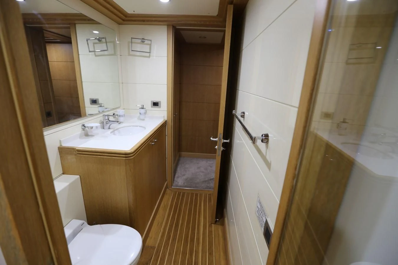 a bathroom with a sink toilet and a shower aboard GOODWILL Yacht for Sale