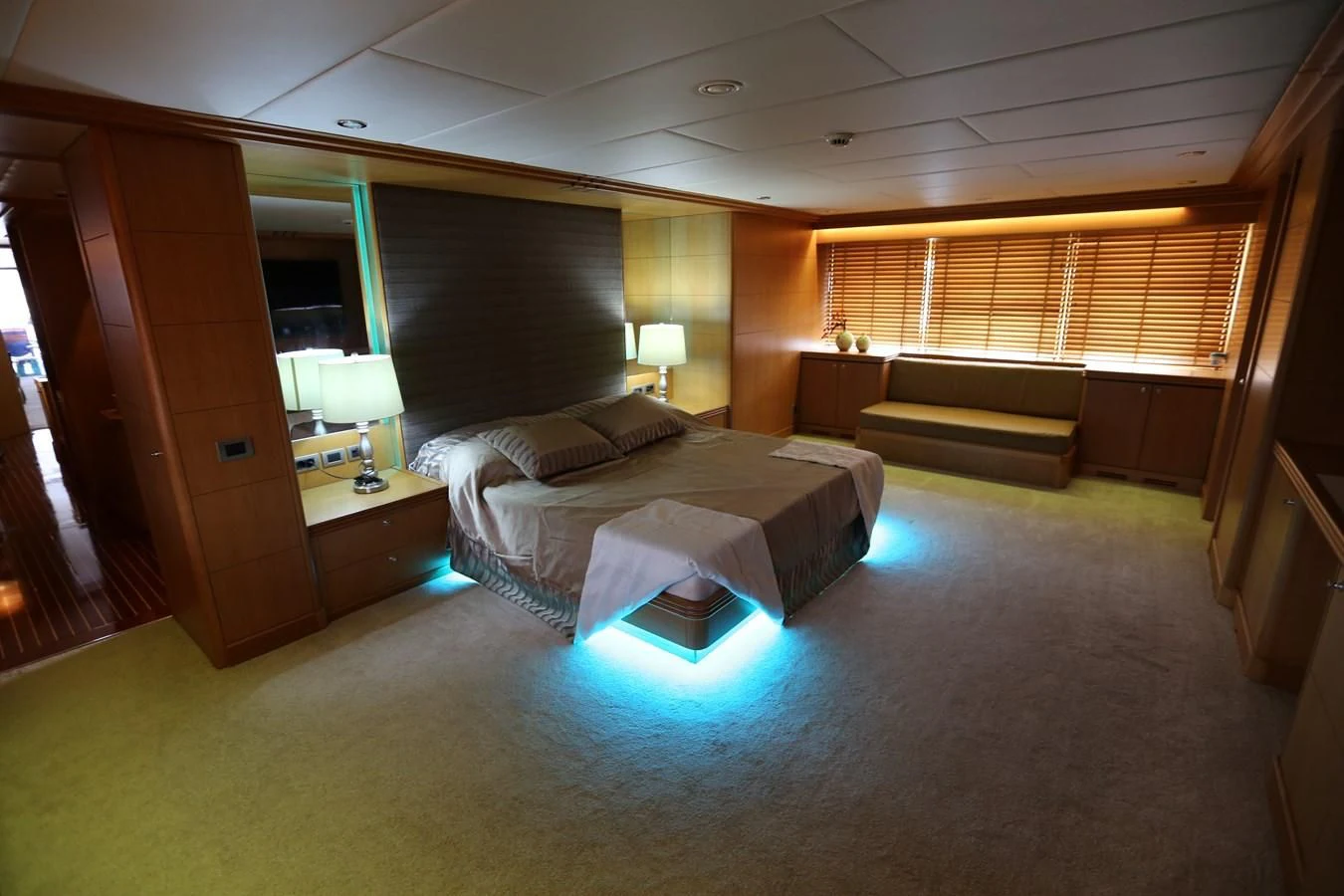 a large bedroom with a large bed aboard GOODWILL Yacht for Sale