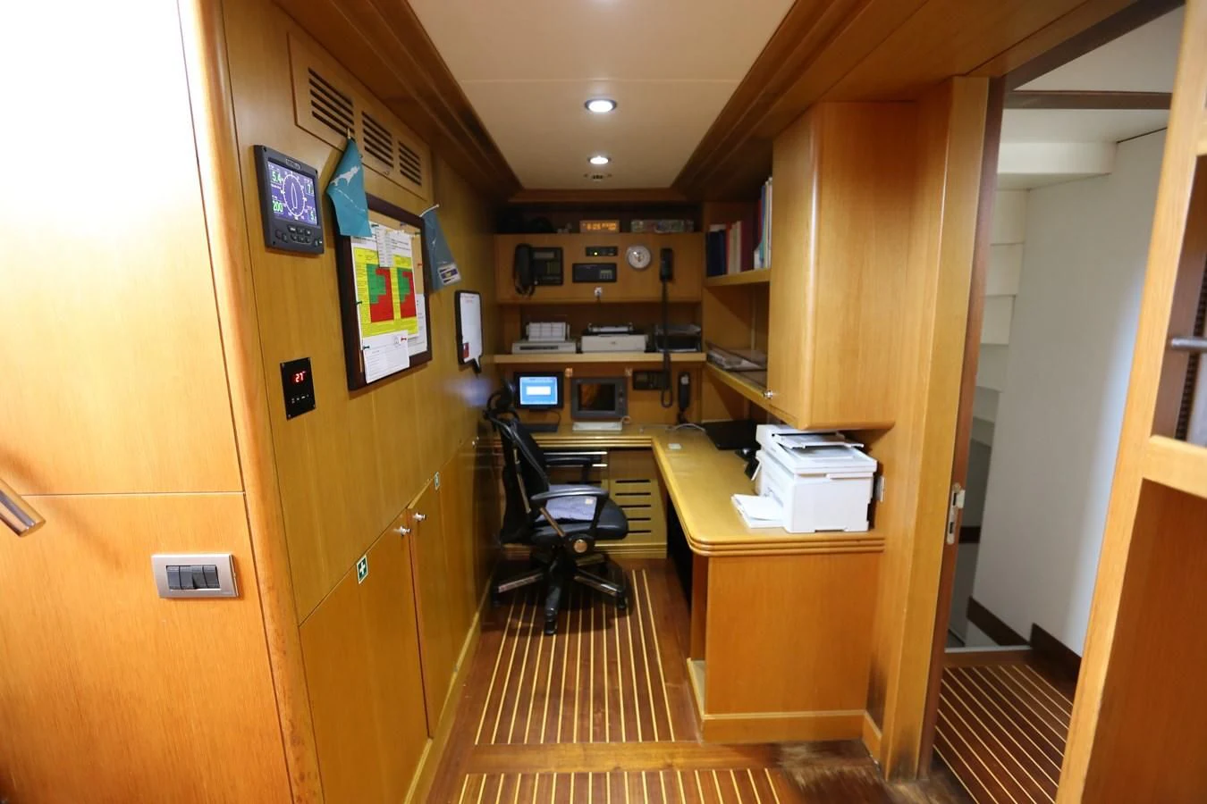 a room with a desk and computer aboard GOODWILL Yacht for Sale
