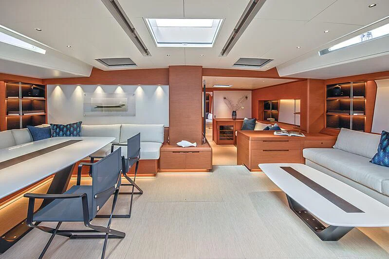 a room with a couch and a table aboard MORGANA Yacht for Sale
