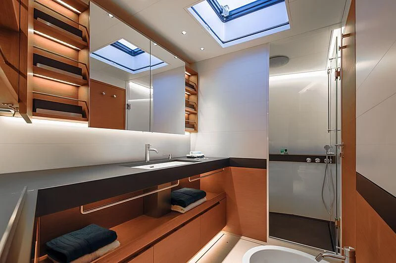 a bathroom with a shower and a sink aboard MORGANA Yacht for Sale