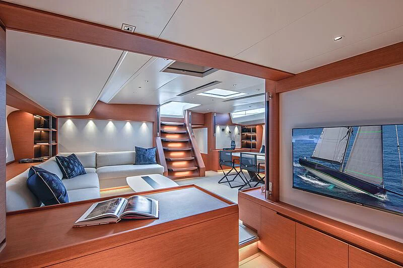 a living room with a large window aboard MORGANA Yacht for Sale