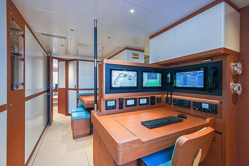 a room with a desk and computer aboard MORGANA Yacht for Sale