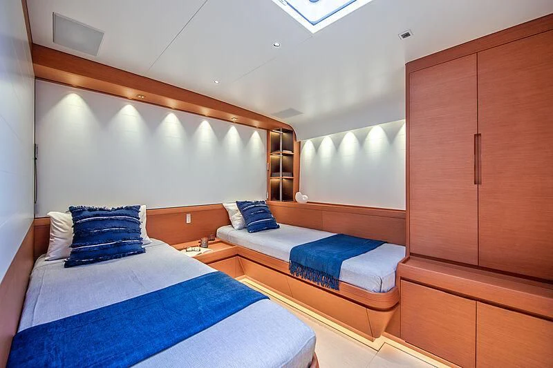 a room with two beds aboard MORGANA Yacht for Sale
