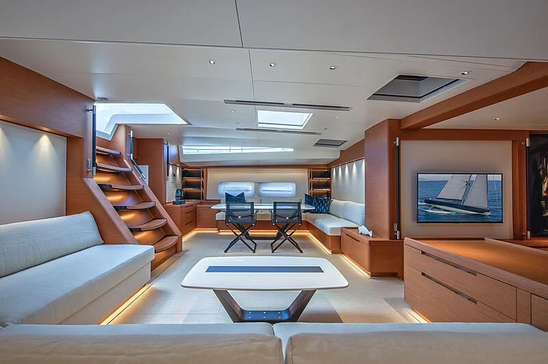 a room with a table and chairs aboard MORGANA Yacht for Sale