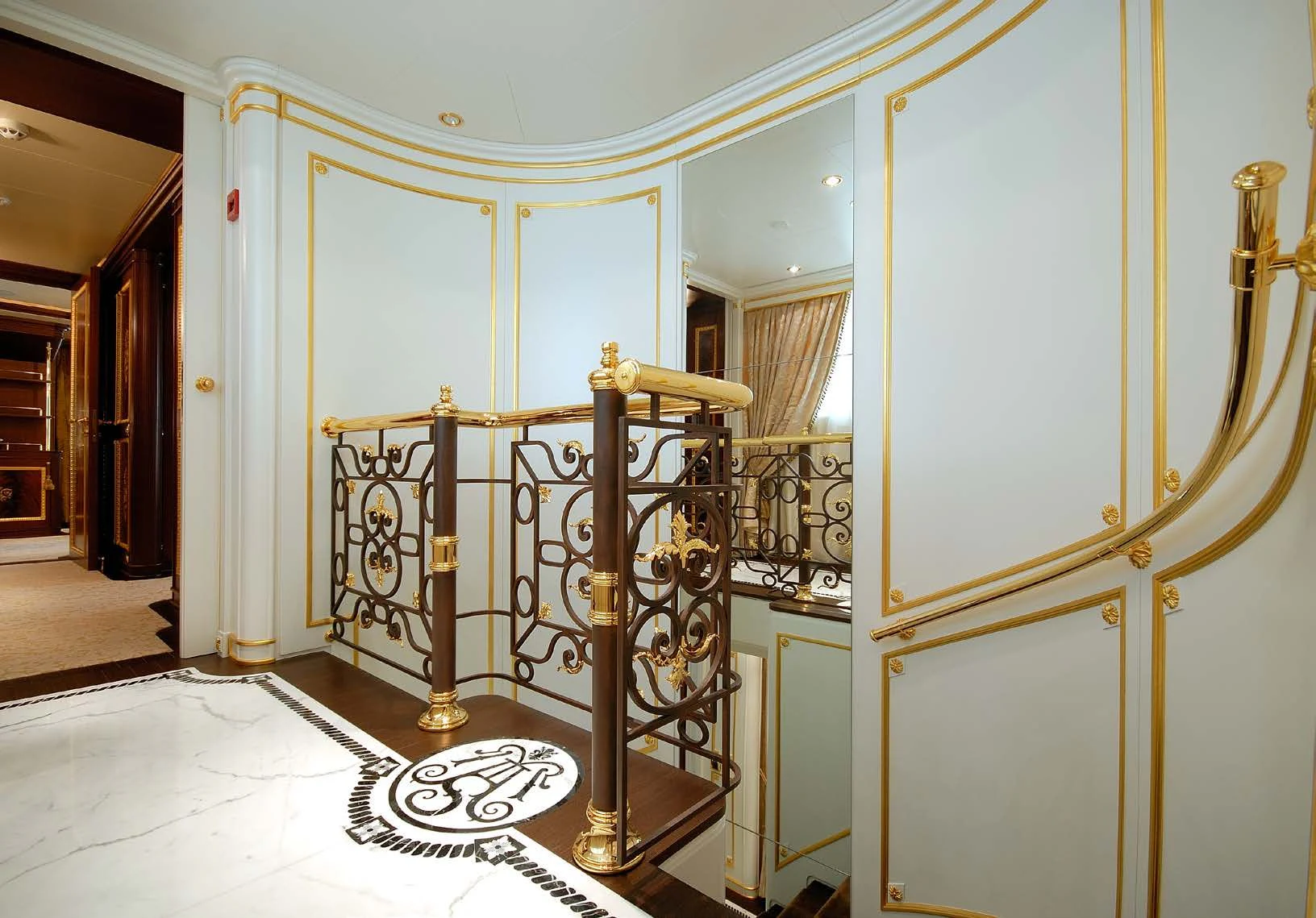 a hallway with a railing aboard AQUAMARINA Yacht for Sale