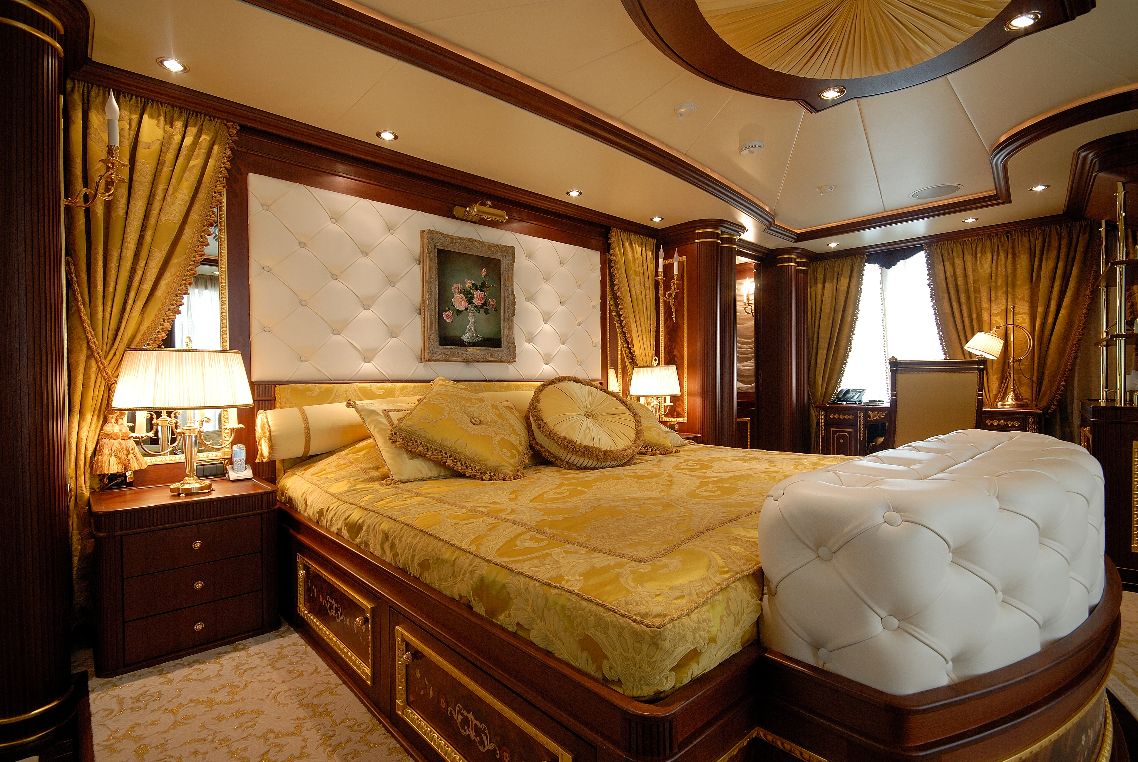 a large bedroom with a large bed aboard AQUAMARINA Yacht for Sale