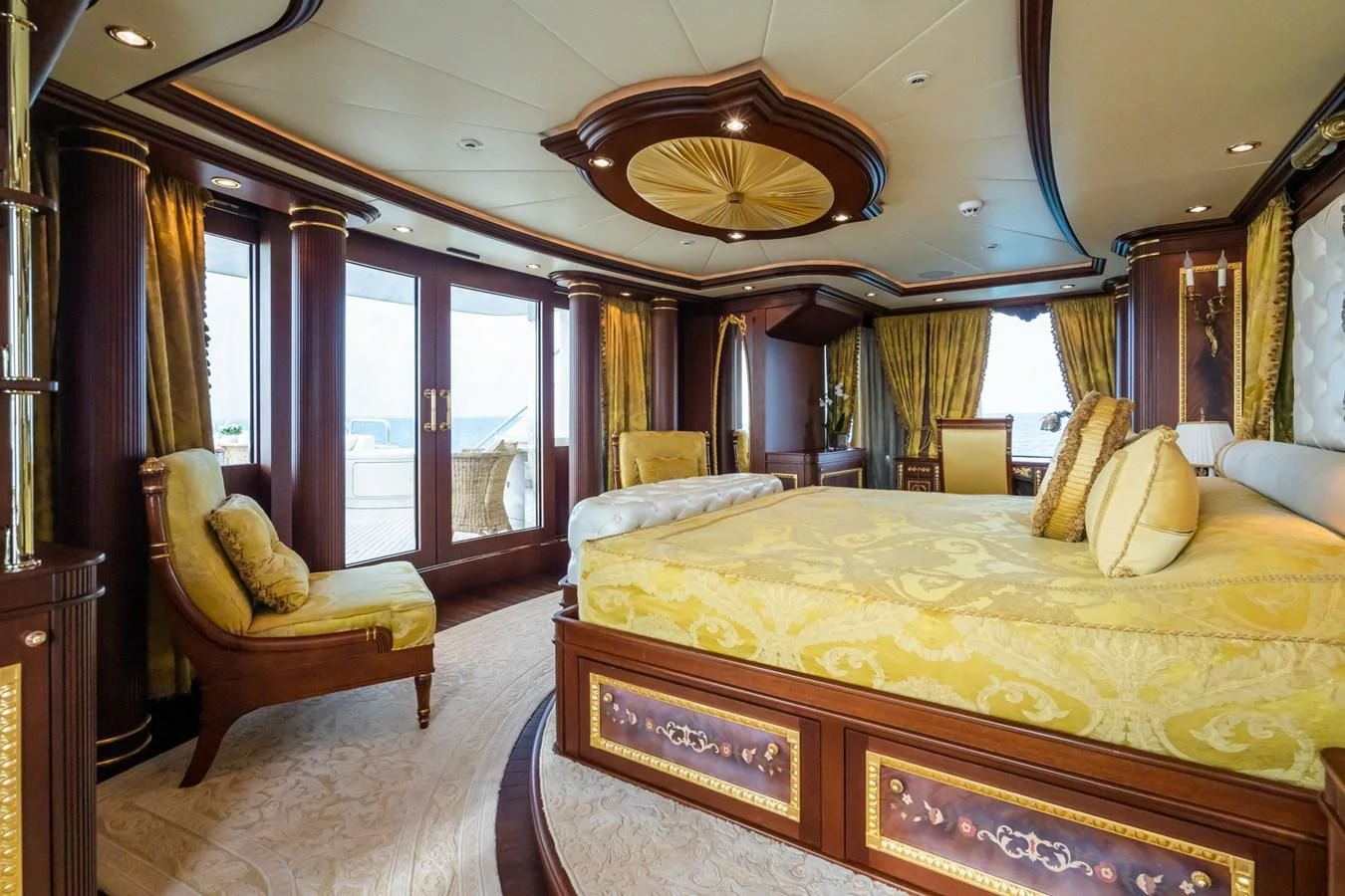 a bedroom with a large bed aboard AQUAMARINA Yacht for Sale