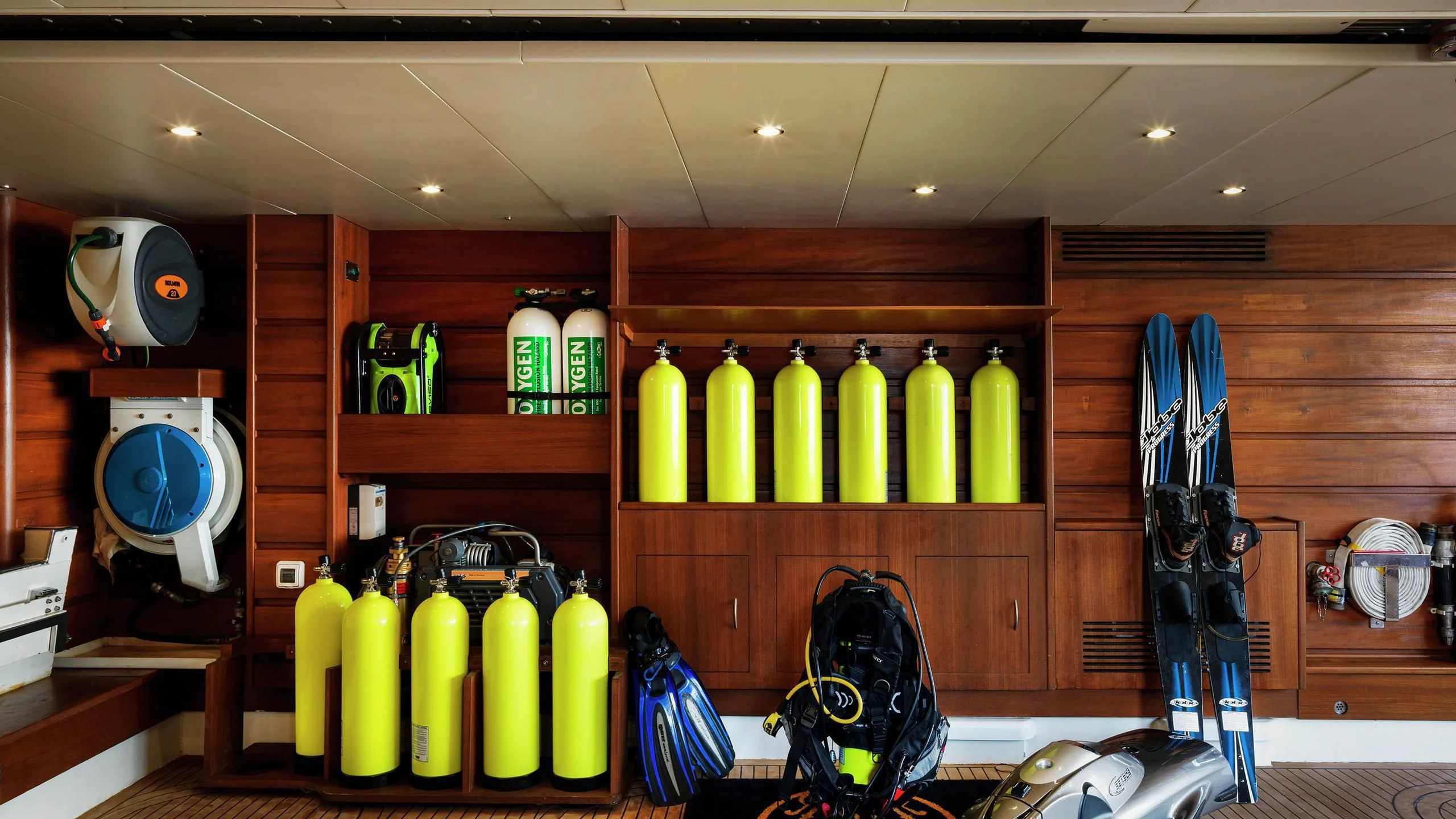a kitchen with a rack of kitchen utensils aboard AQUAMARINA Yacht for Sale