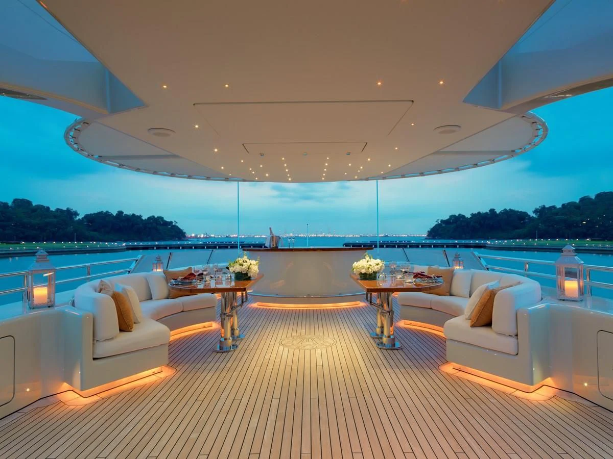 a large living room with a large pool and a large patio aboard AQUAMARINA Yacht for Sale