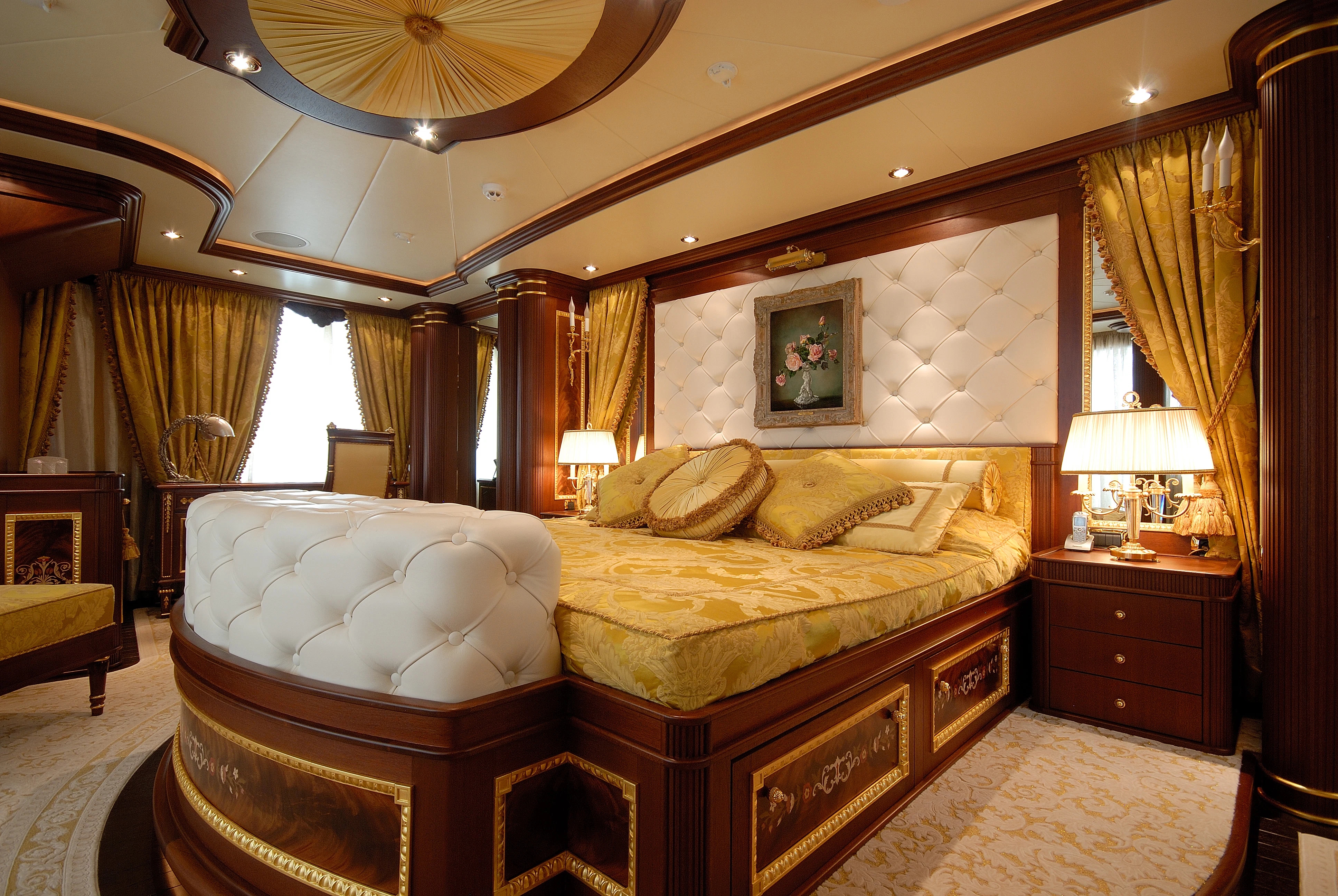 a large bedroom with a large bed aboard AQUAMARINA Yacht for Sale