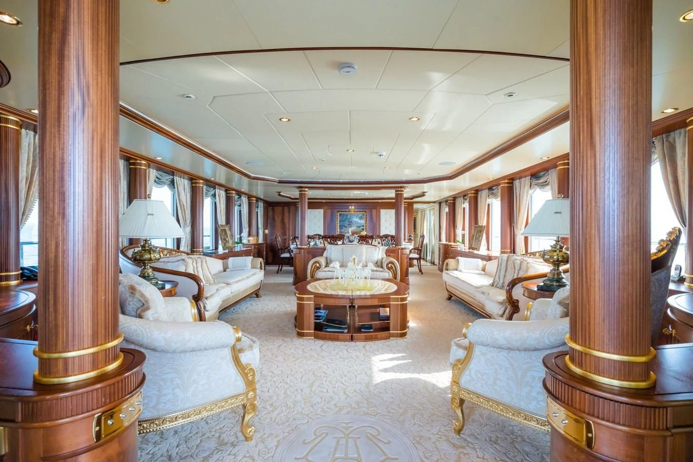 a living room with a large mirror aboard AQUAMARINA Yacht for Sale