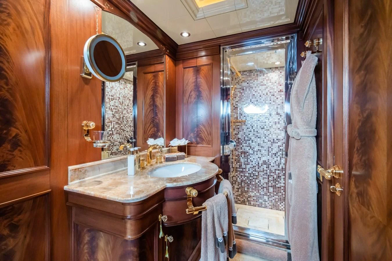 a bathroom with a sink and a mirror aboard AQUAMARINA Yacht for Sale