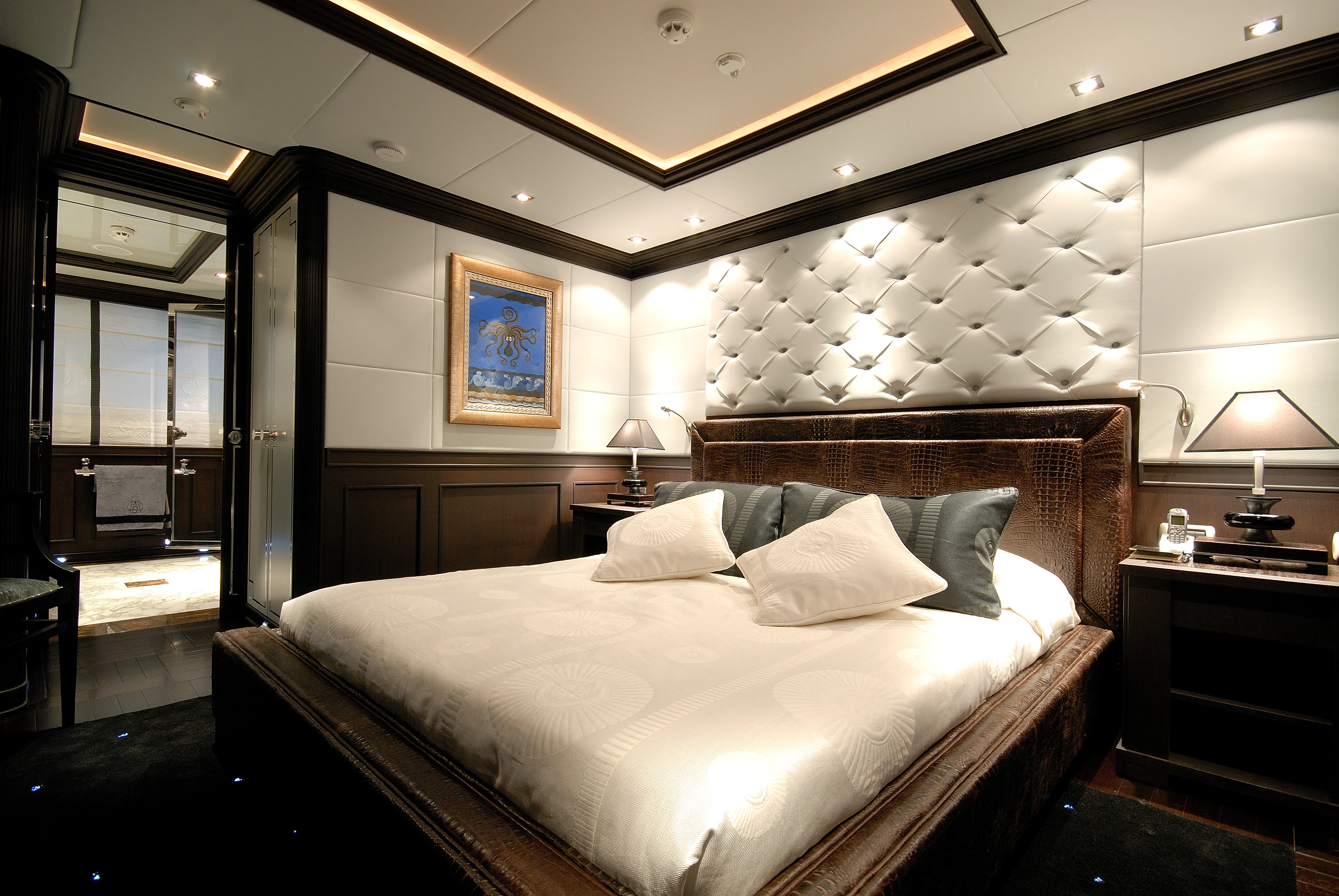 a large bed in a hotel room aboard AQUAMARINA Yacht for Sale