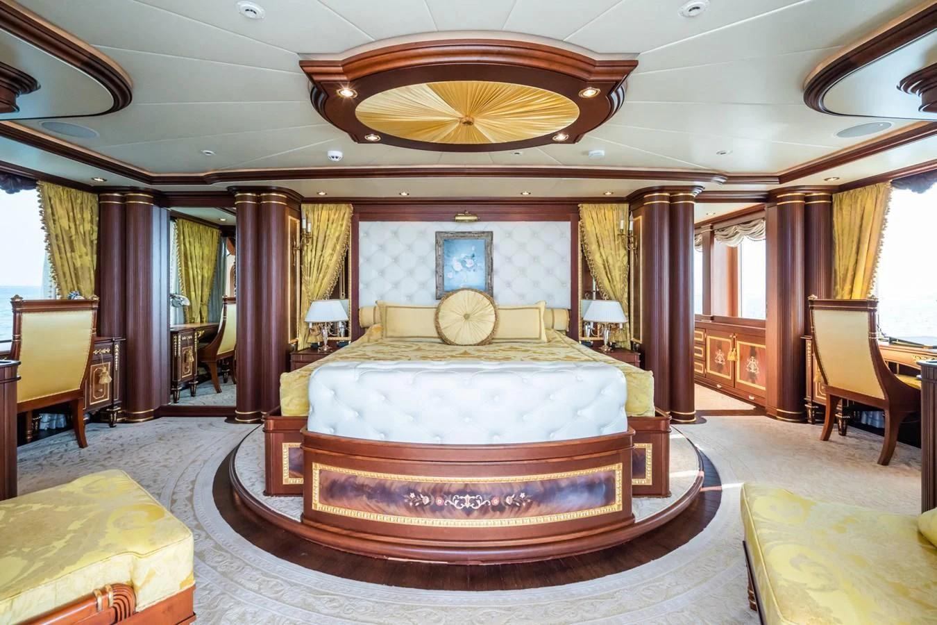 a large bedroom with a large bed aboard AQUAMARINA Yacht for Sale
