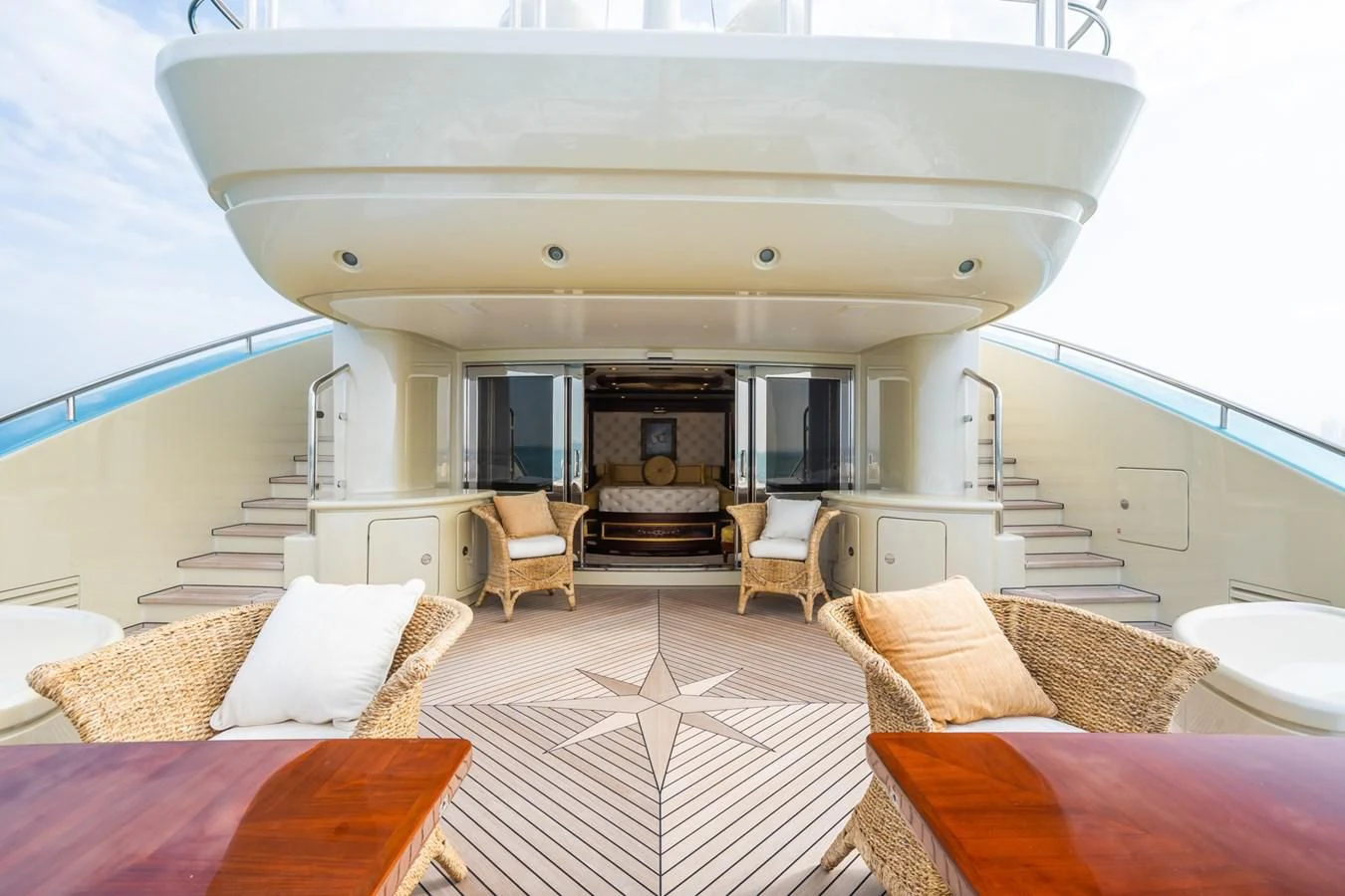 a large living room with a fireplace aboard AQUAMARINA Yacht for Sale