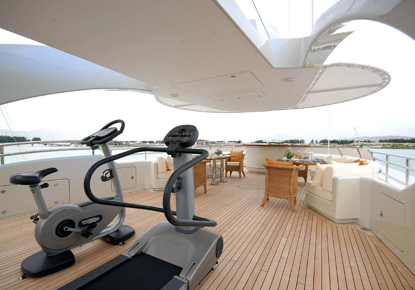 a lounge area with a table and chairs on it aboard AQUAMARINA Yacht for Sale