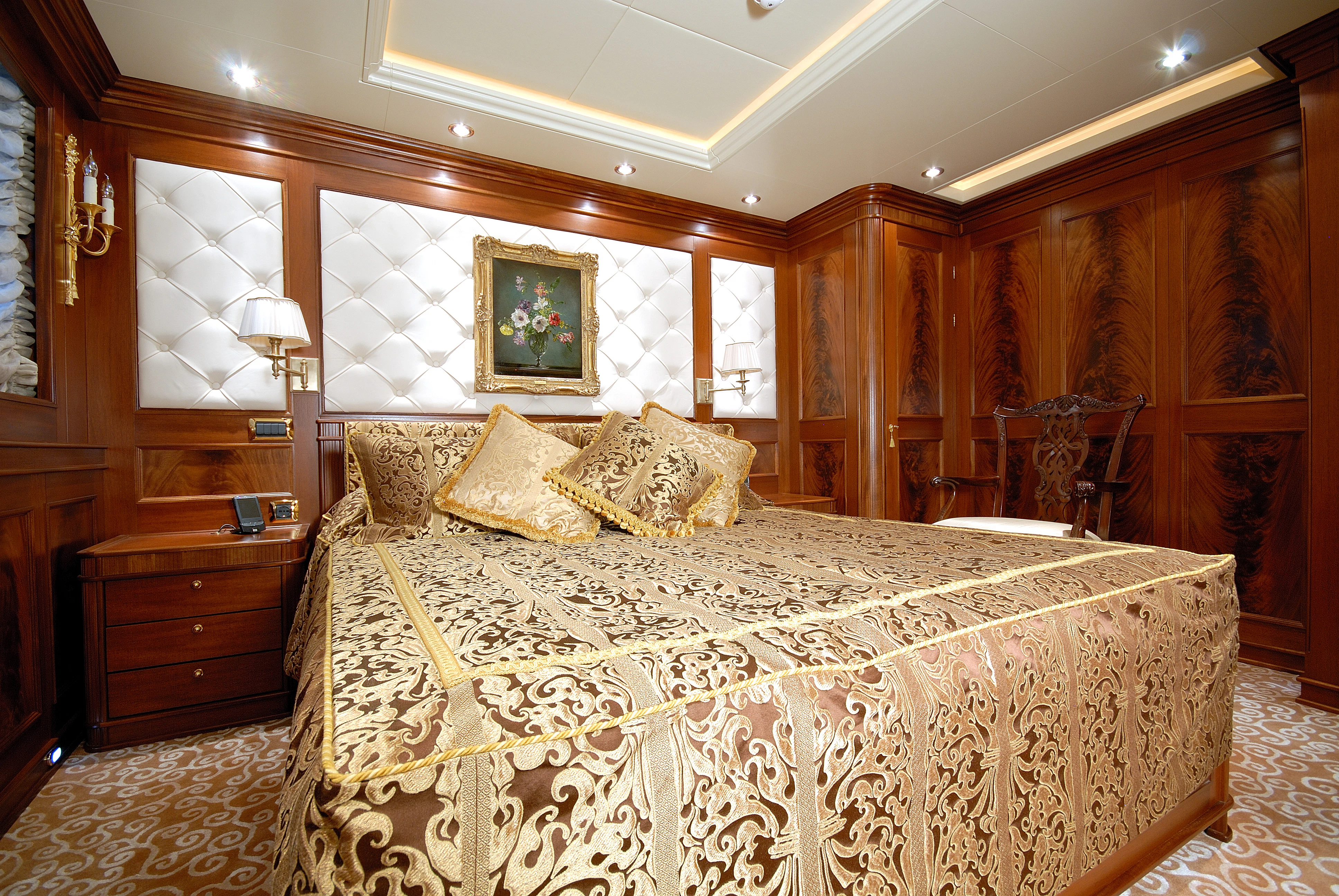 a large bed in a room aboard AQUAMARINA Yacht for Sale