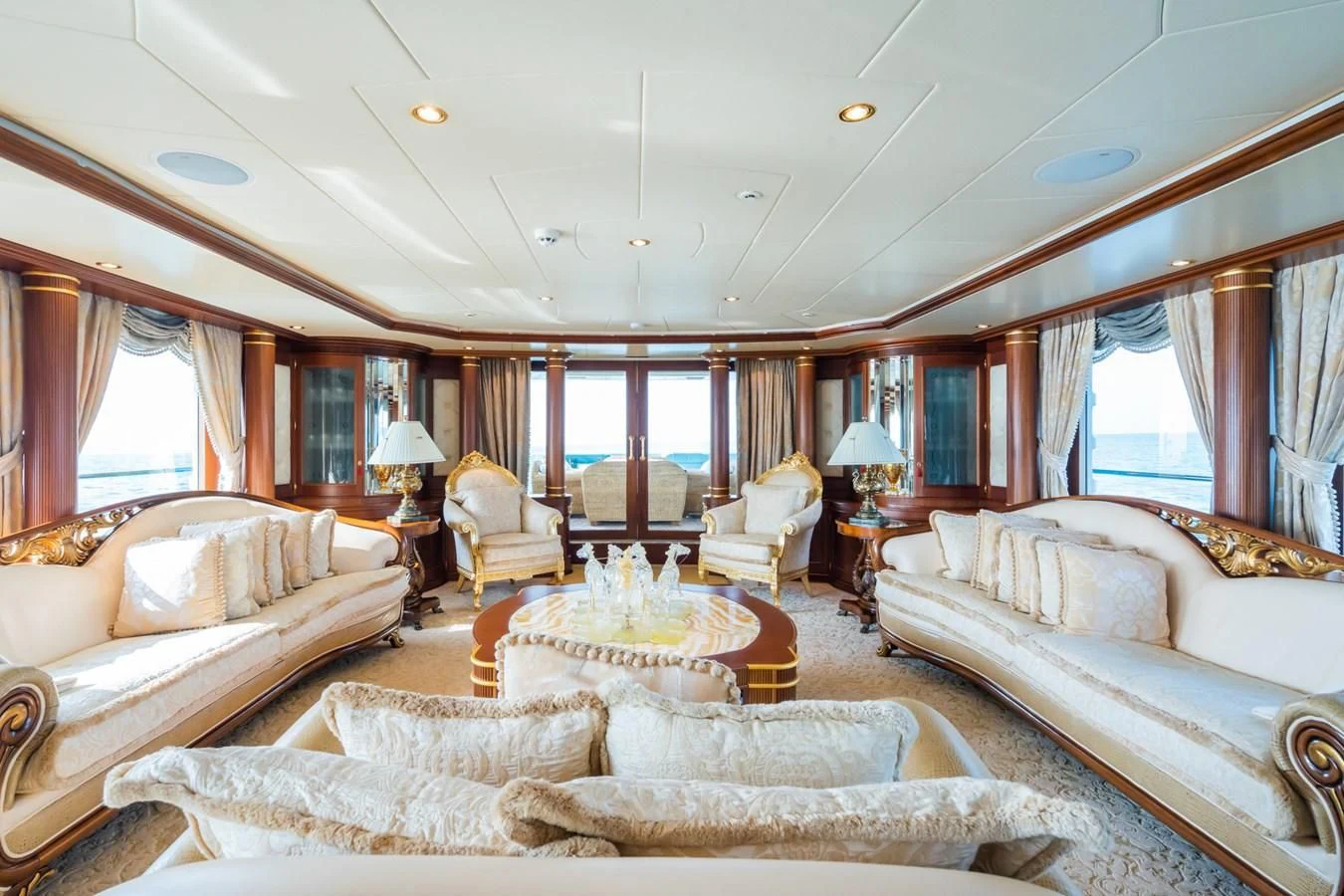 a living room with a large window aboard AQUAMARINA Yacht for Sale