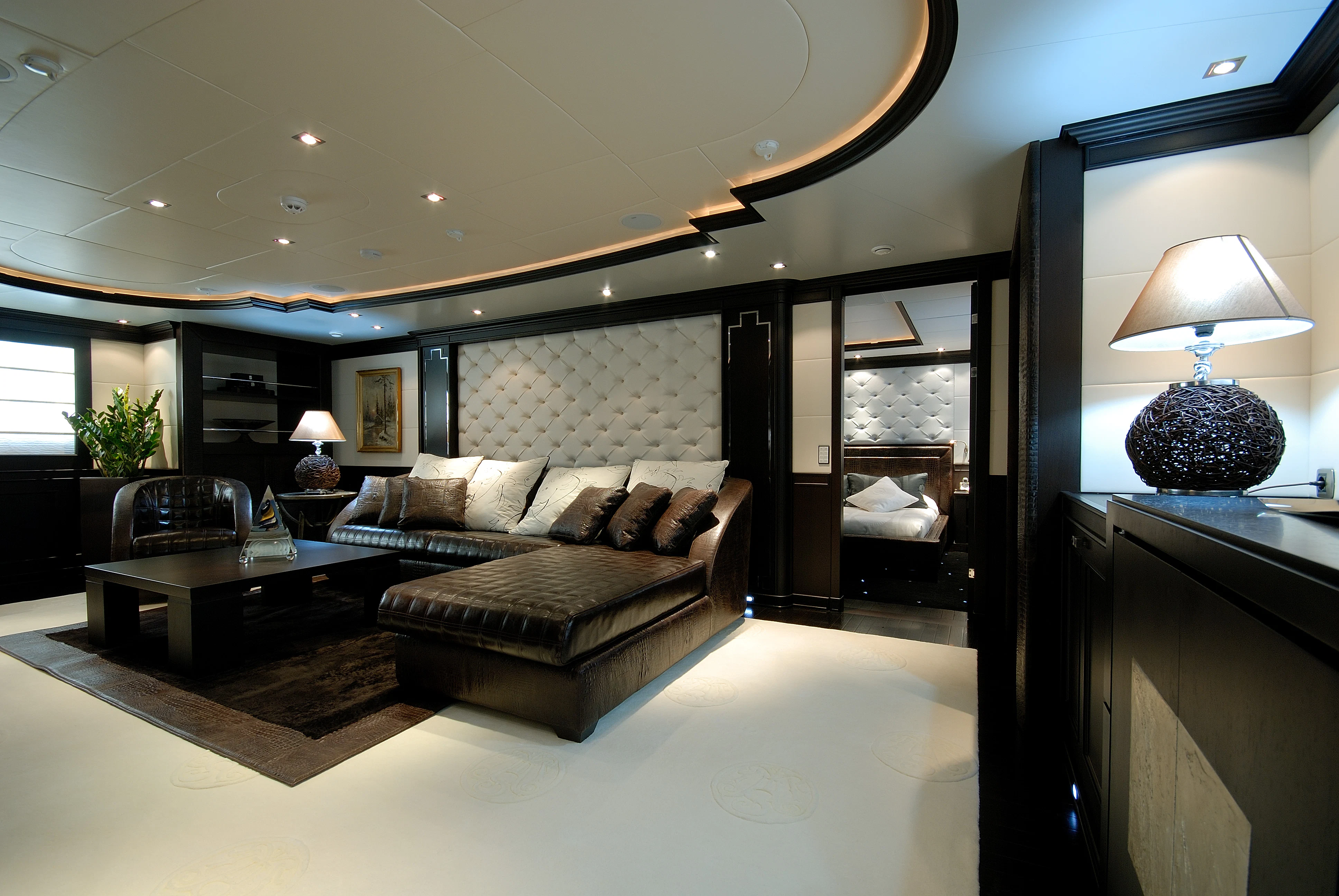 a living room with a large mirror aboard AQUAMARINA Yacht for Sale