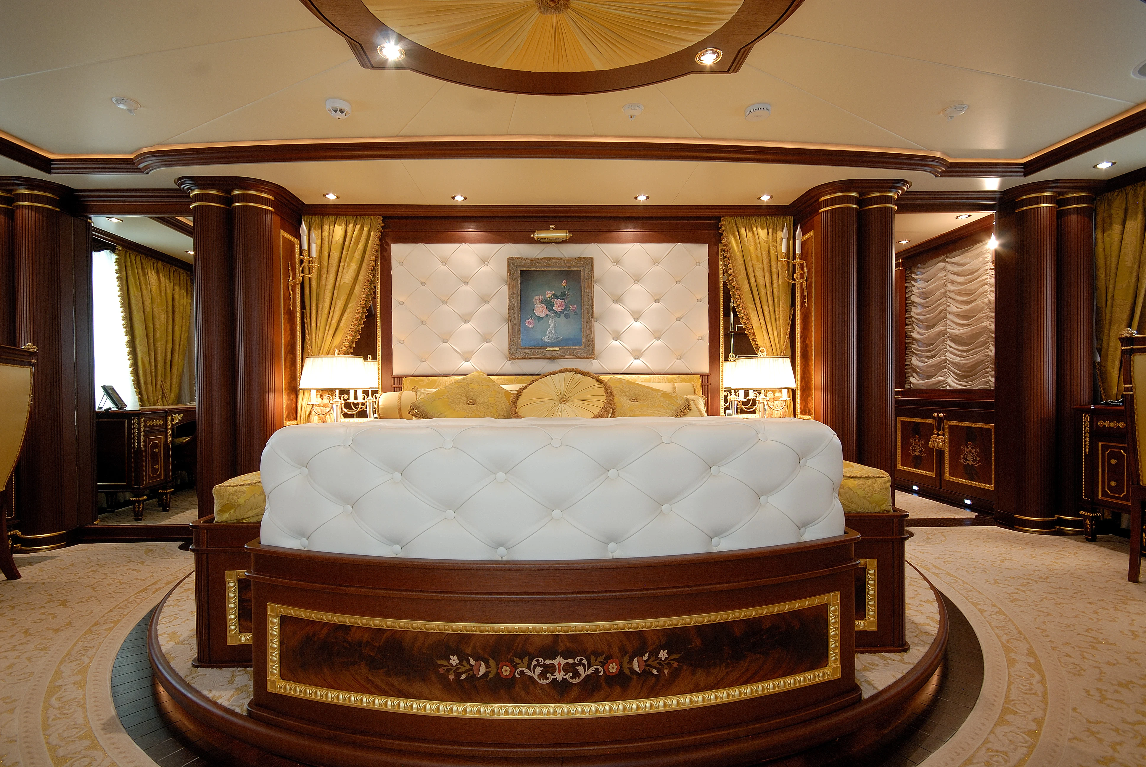 a large bedroom with a large bed aboard AQUAMARINA Yacht for Sale