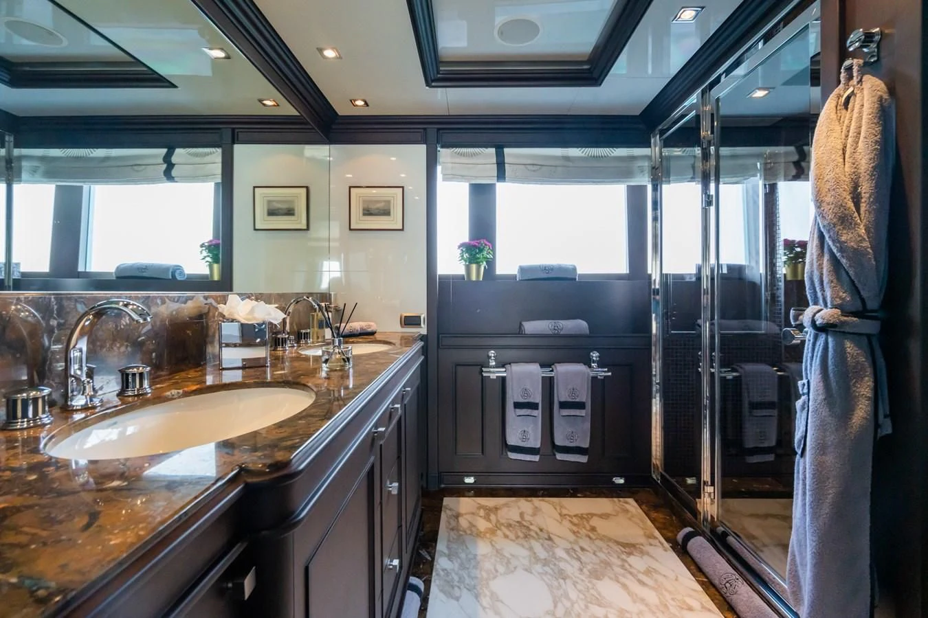 a kitchen with a sink and cabinets aboard AQUAMARINA Yacht for Sale